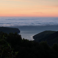 Sunrise with clouds at Hinewai Reserve